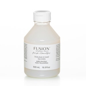May include: A clear plastic bottle of Fusion Mineral Paint Tough Coat Gloss, a wipe-on poly non-yellowing finish. The bottle is labeled with the product name, brand, and size: 500 mL (16.9 fl oz).