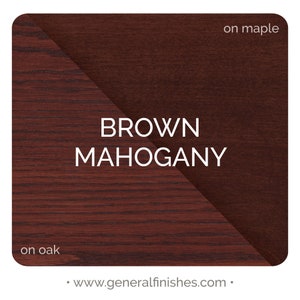 May include: Brown Mahogany wood stain color swatch on oak and maple wood. The stain is a deep reddish brown color.  www.generalfinishes.com