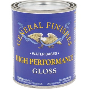 May include: A blue can of General Finishes High Performance Gloss water-based paint. The can is labeled with the company logo, product name, and size: (473 ml) 1 pint (US).