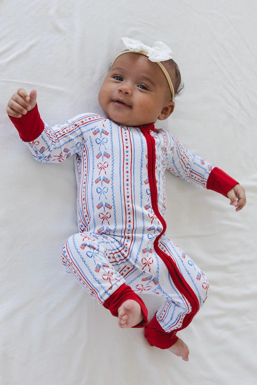 CAROLINE ZIPPY | Dainty Toddler Bamboo Pajamas | USA Flag | Coquette Bows  | 4th of July | Preppy | Independence Day | Baby Zippy Romper