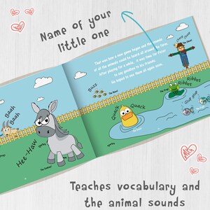 May include: A colorful children's book with illustrations of farm animals and their sounds. The book features a donkey, a goat, a bee, a duck, a frog, and a chick. The text on the cover reads "Name of your little one".