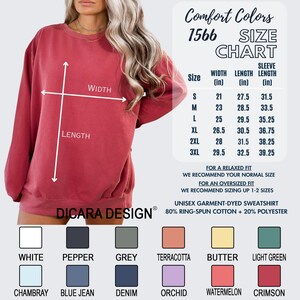 May include: Size chart for a unisex sweatshirt in various colors. The chart shows the width, length, and sleeve length in inches for sizes S through 3XL. The sweatshirt is made of 80% ring-spun cotton and 20% polyester.