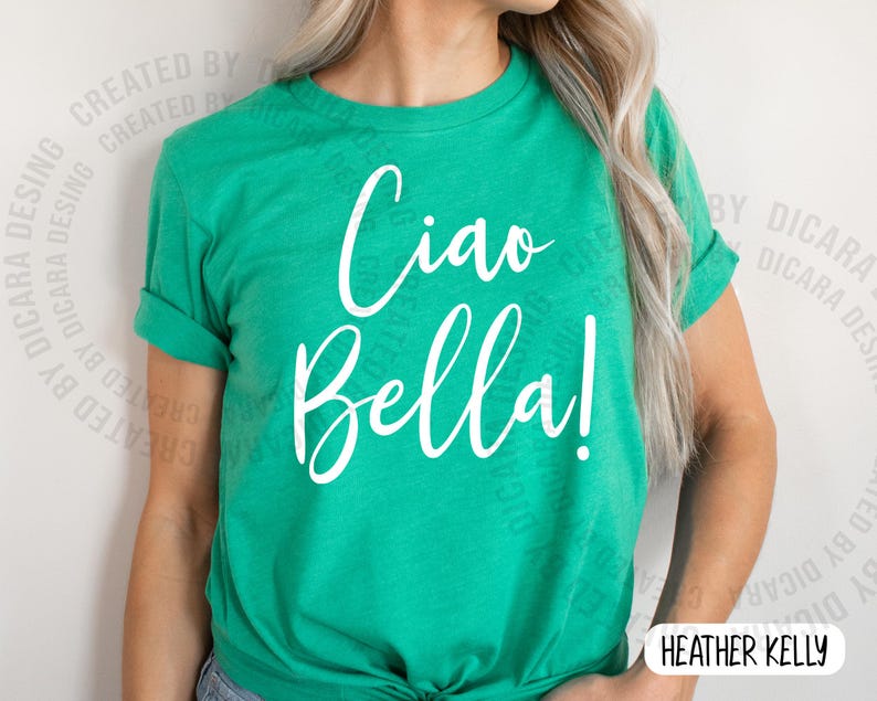 K&ouml;nnte beinhalten: Ein leuchtend gr&uuml;nes T-Shirt mit dem Schriftzug "Ciao Bella!" in wei&szlig;er Schrift. Das Shirt hat kurze &Auml;rmel und eine lockere Passform. Der Text ist mittig auf der Vorderseite platziert.
