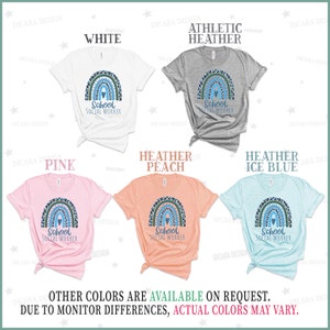 Puede incluir: Un conjunto de camisetas con un arco&iacute;ris con un coraz&oacute;n y el texto "School Social Worker". Las camisetas est&aacute;n disponibles en blanco, gris deportivo, melocot&oacute;n jaspeado y azul hielo jaspeado.