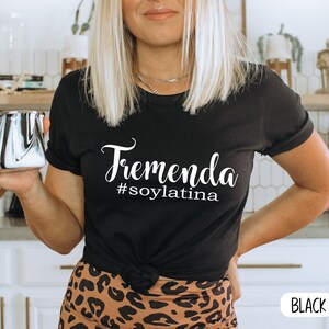 May include: Black t-shirt with white text that reads "Tremenda #soylatina".
