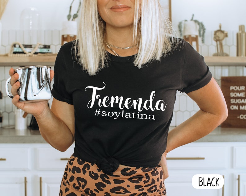 May include: Black t-shirt with white text that reads "Tremenda #soylatina".