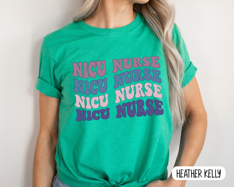 May include: A green t-shirt with the text "NICU NURSE" repeated four times in a retro font. Each word is a different color: pink, purple, blue, and light purple.