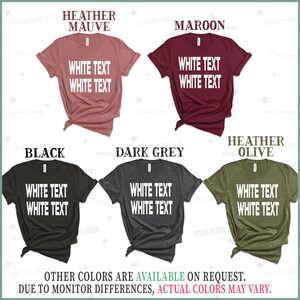 May include: Six t-shirts in different colors with the text "White Text White Text" printed on the front. The colors are heather mauve, maroon, black, dark grey, and heather olive.