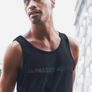 May include: A black tank top with a rainbow gradient graphic that says "Alphabet Mafia".