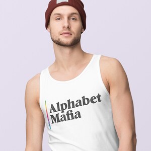 May include: A white tank top with a rainbow stripe and the text "Alphabet Mafia" in black.