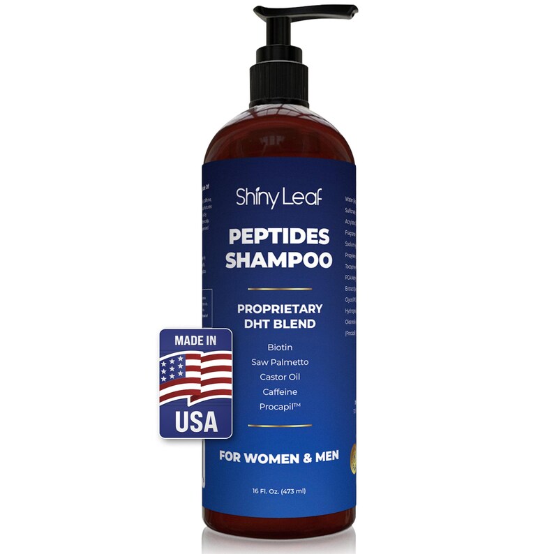 May include: A brown bottle of Shiny Leaf Peptides Shampoo with a black pump dispenser. The blue and white label reads "PEPTIDES SHAMPOO" and "PROPRIETARY DHT BLEND". It also includes a "MADE IN USA" sticker and states "FOR WOMEN & MEN". The bottle contains 473 ml.