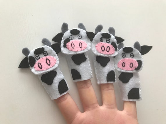 Cow sales finger puppet