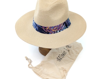 Chapeau de soleil panama de voyage pliable avec un ruban tropical