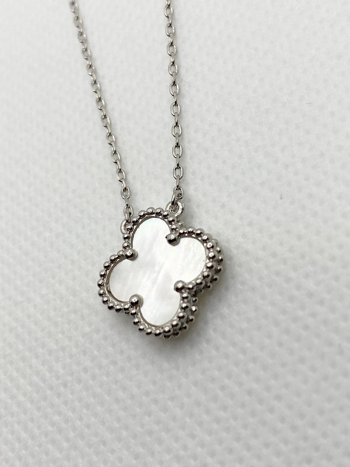 Clover mother of Pearl necklace white gold plated. Etsy