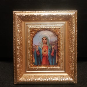 Sacred Heart of Mary catholic  icon with frame decorated with natural amber.
