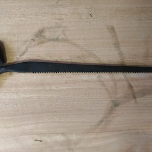 Vintage Hand forged rusty  saw.