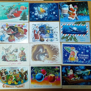 Set van 12 vintage gebruikte postkaarten USSR Happy New Year.