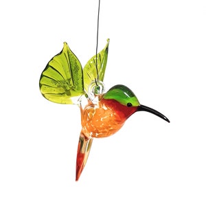 Hummingbird flying made of glass -yellow/orange/green-