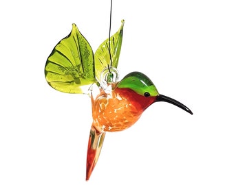 Hummingbird flying made of glass -yellow/orange/green-