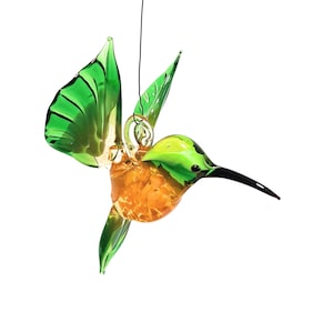 Hummingbird flying made of glass -green/yellow-