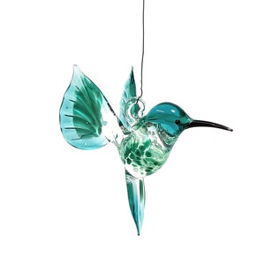 Hummingbird flying made of glass turquoise image 1