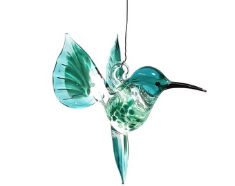 Hummingbird flying made of glass -turquoise-