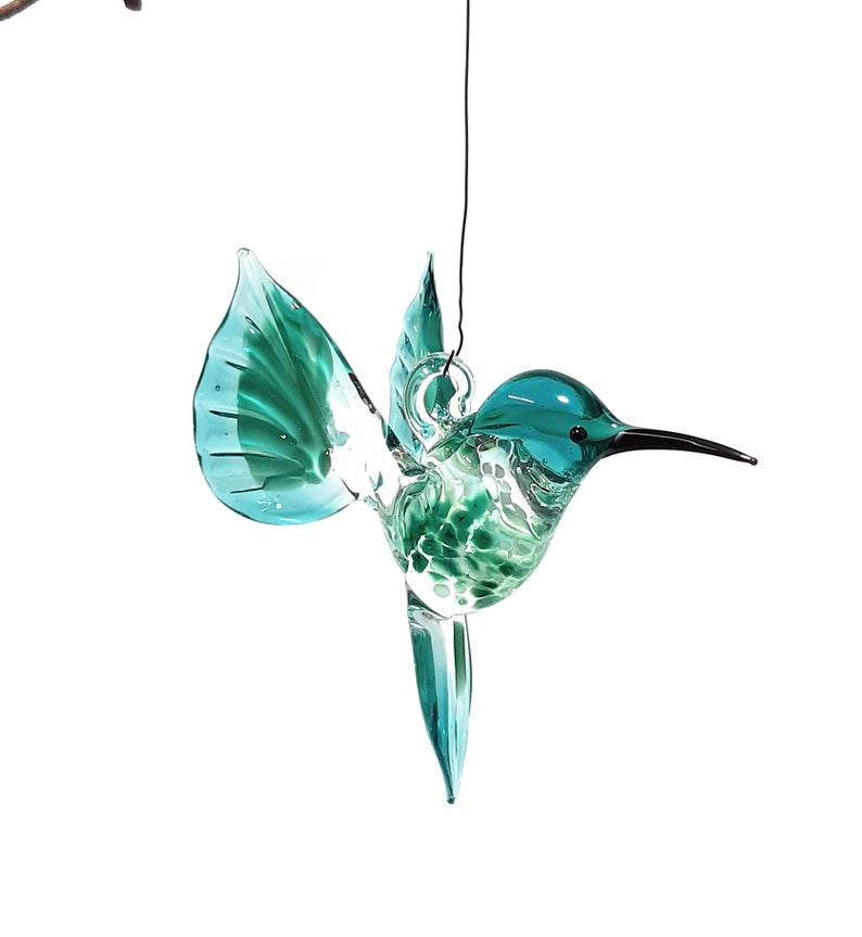 Hummingbird flying made of glass turquoise image 1