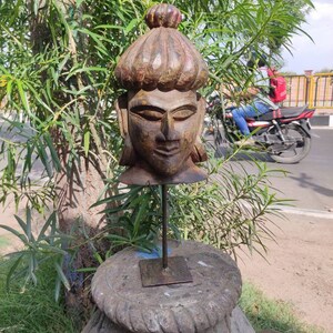 Wooden carved Buddha figure on metal stand/home decor article/wooden statue/wooden figurines/carved wood buddha/handmade buddha/wood buddha