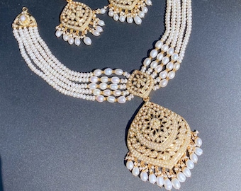 Finely crafted all pearl Necklace Set in gold plated silver, crafted with traditional Indian jadau Technique
