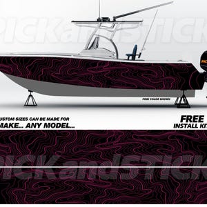 May include: A black and pink boat wrap with a topographic design. The wrap is made of 3M vinyl and is available in custom sizes. A free install kit is included.