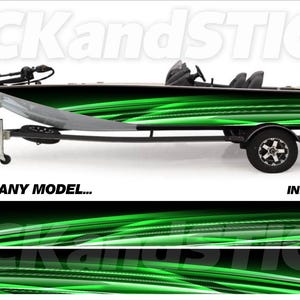 May include: A green and black bass boat on a trailer. The boat has a sleek design with a vibrant green wave pattern along the sides. The boat is equipped with a motor and fishing equipment.