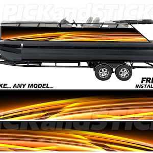 Op de afbeelding: Zwarte pontonboot op een aanhanger, met een opvallend oranje en geel golfpatroon op de romp. De afbeelding bevat de tekst "ANY MAKE... ANY MODEL..." en "FREE INSTALL KIT."