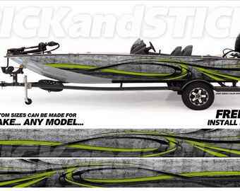 May include: A gray and black boat wrap with green accents. The wrap features a swirling design with black and white lines. The text "PICKandSTICK" is visible on the boat and the text "FREE INSTALL KIT" is visible on the bottom of the image.