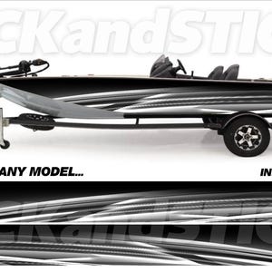 May include: A black and silver fishing boat on a trailer. The boat has a sleek design with a motor and seating. The image includes the text "PICKandSTICK" and "3M ANY MAKE... ANY MODEL..." and "FREE INSTALL KIT".