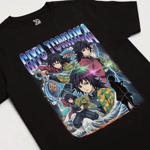 May include: Black t-shirt featuring a graphic of Giyu Tomioka from Demon Slayer. The design includes multiple images of the character with a sword, set against a backdrop of water and lightning. The text "GIYU TOMIOKA" is displayed across the top.