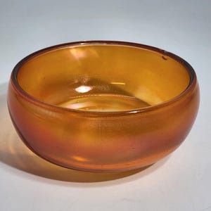 Amber Iridescent Glass Bowl Circa Mid-Century Modern Handcrafted With Unique Details