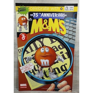 May include: A comic book cover celebrating the 75th anniversary of M&M's sweets. The cover features a cartoon M&M character with a magnifying glass, looking at a newspaper headline that reads "Milly Bad in the Morning".