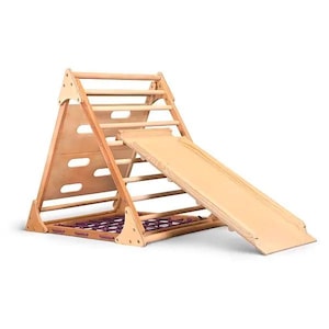 May include: Wooden climbing frame with a slide attached. The frame has a ladder with rungs and a platform at the top. The slide is made of wood and has a smooth surface. The frame is painted in a natural wood color.