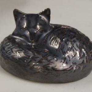 FOX resting, curled fox figure