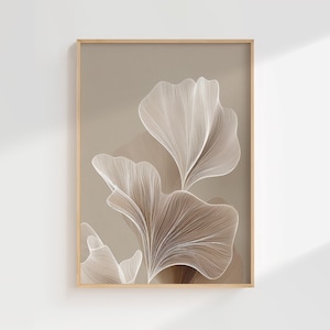 May include: A framed art print with a botanical theme. The artwork presents abstract floral forms in white and brown hues, set against a neutral backdrop. The print is enclosed within a light-toned wooden frame, ideal for interior decoration.
