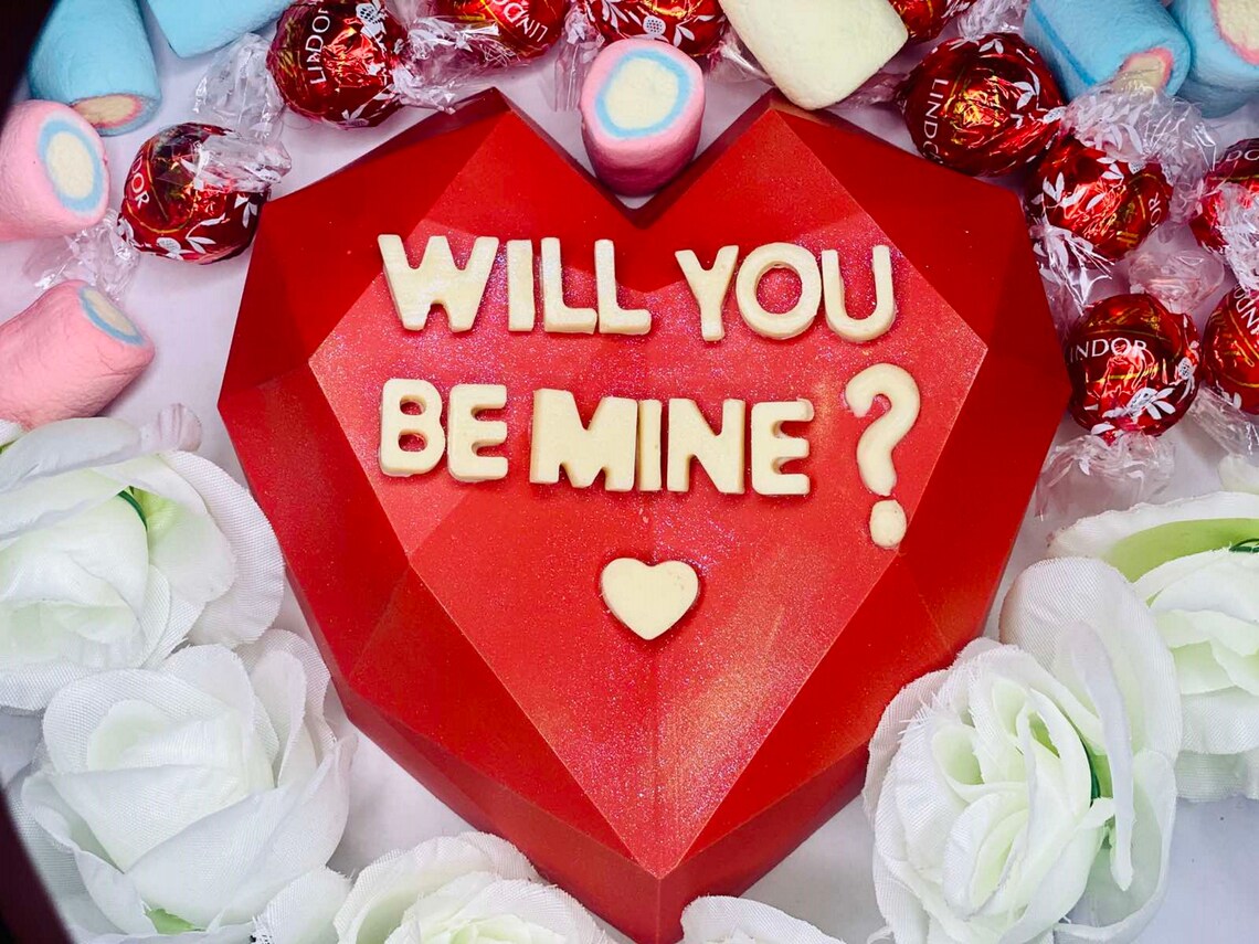 breakable chocolate heart with money