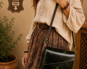 May include: A dark green leather crossbody bag with a flap closure and visible stitching, worn with a beige long-sleeve blouse featuring lace trim, a brown leather belt, and a patterned skirt. The image includes the text LEATHER - PATTERN - PDF.