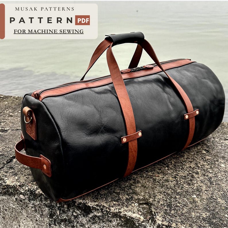 May include: A black leather duffel bag with brown leather straps, handles, and trim, featuring a top zipper closure and side handle. The image includes text that reads: MUSAK PATTERNS PATTERN PDF FOR MACHINE SEWING.