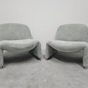 Pair of Iconic Alky Chairs designed by Giancarlo Piretti for Artifort in 1969 reupholstered in pale green boucle // Made in Italy in 1960s