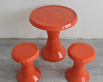 Space Age Patio Set &quot;Diabolo&quot; consisting of a Table and 4 Stools done in Orange Plastic // Made in Yugoslavia in 1970s
