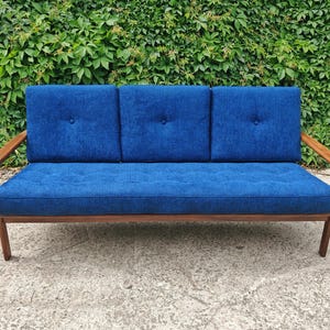 Mid Century Modern 3-seater sofa done in teak, Denmark 1960s
