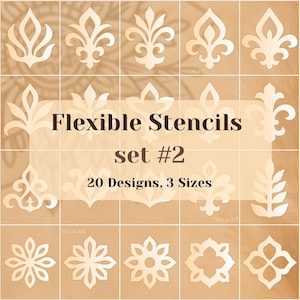 Puede incluir: Un conjunto de 20 plantillas flexibles con diversos diseños florales y ornamentales. Las plantillas son de color beige claro y están dispuestas en una cuadrícula. El texto "Flexible Stencils set #2" se muestra en el centro, junto con "20 Designs, 3 Sizes."
