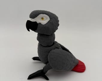 Figurka Fidget z przegubem w kolorze afrykańskim Grey