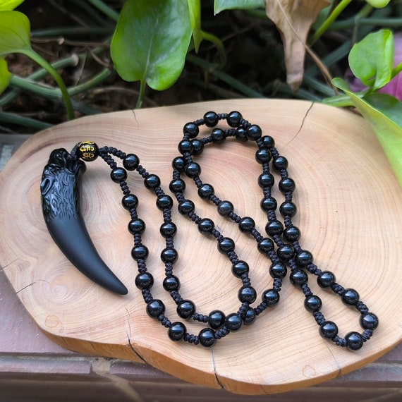 Obsidian wolf tooth necklace discount
