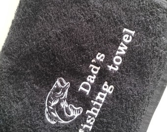 Fishing towel 100% soft cotton towelling handy size available in five colours ,with fish design or fish design with personalised text